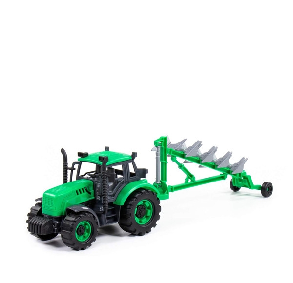 Traktor Progress s pluhom zelený
